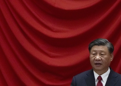 Chinese President Xi Jinping delivers his speech at a dinner marking the 74th anniversary
