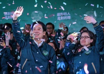 TAIPEI, TAIWAN - JANUARY 13: Confetti flies over the stage and crowd as Taiwan's Vice President and presidential-elect from the Democratic Progressive Party (DPP) Lai Ching-te (L) and his running mate Hsiao Bi-khim speak to supporters at a rally at the party's headquarters on January 13, 2024 in Taipei, Taiwan. Taiwan voted in a general election on Jan. 13 that will have direct implications for cross-strait relations. 